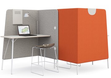Workplace with gray and orange screens.