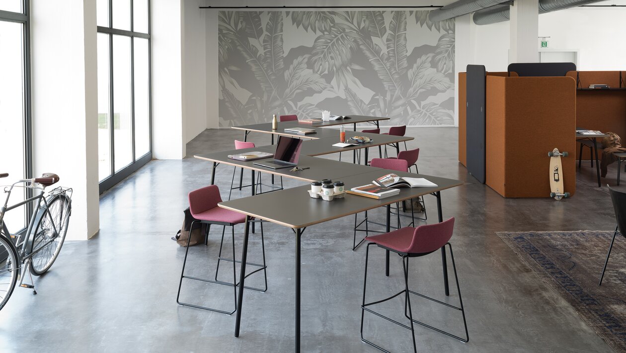 Meeting tables with barstools.
