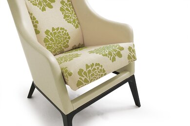 Green club chair with  detachable cover.