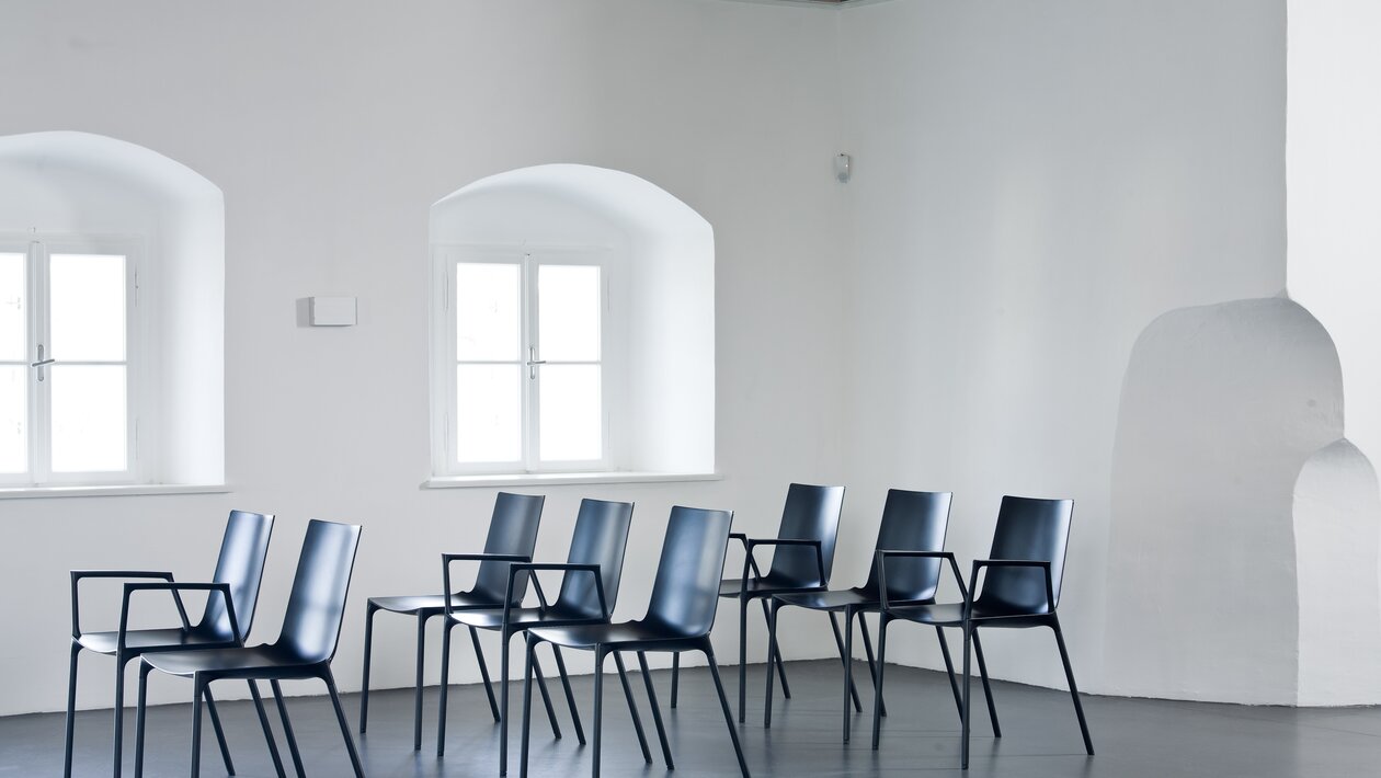 Black chairs in a row.