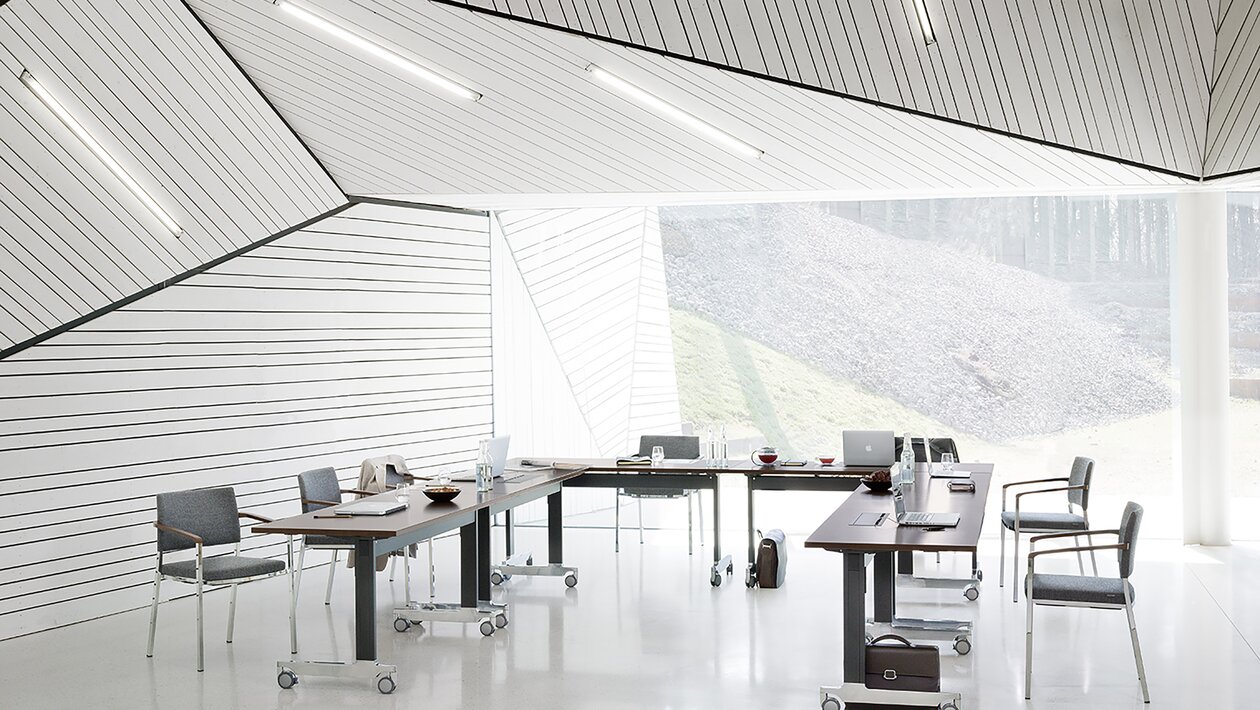 Table system in glazed room.