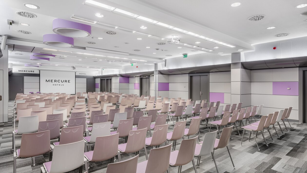 Big seminar room with chairs. 
