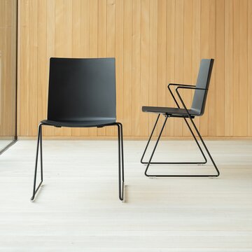 Black skid-base chair.