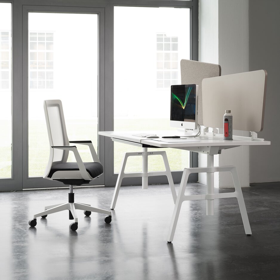 White office desk in an office.
