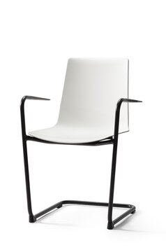White cantilever chair with black arms.