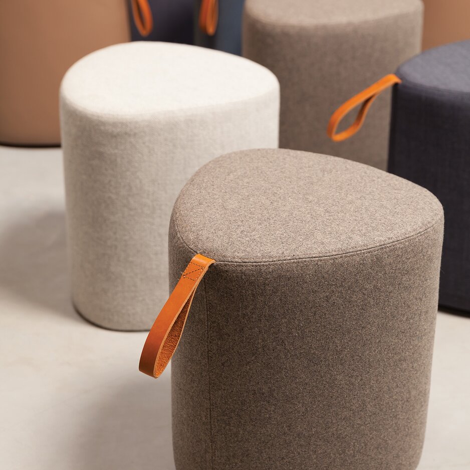 Detailed view of poufs.