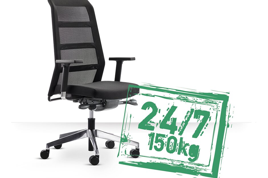 Black swivel chair with a green banner in front of it.
