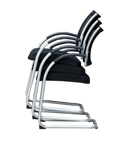 Stacked cantilever chairs.