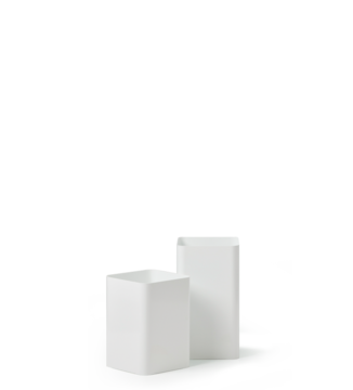 Two white waste paper baskets.