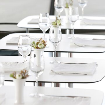 White bistro tables.