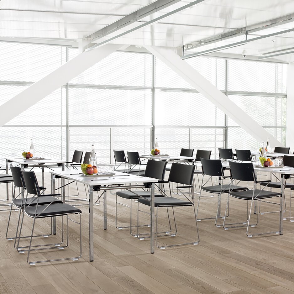 seminar room with tables and chairs.