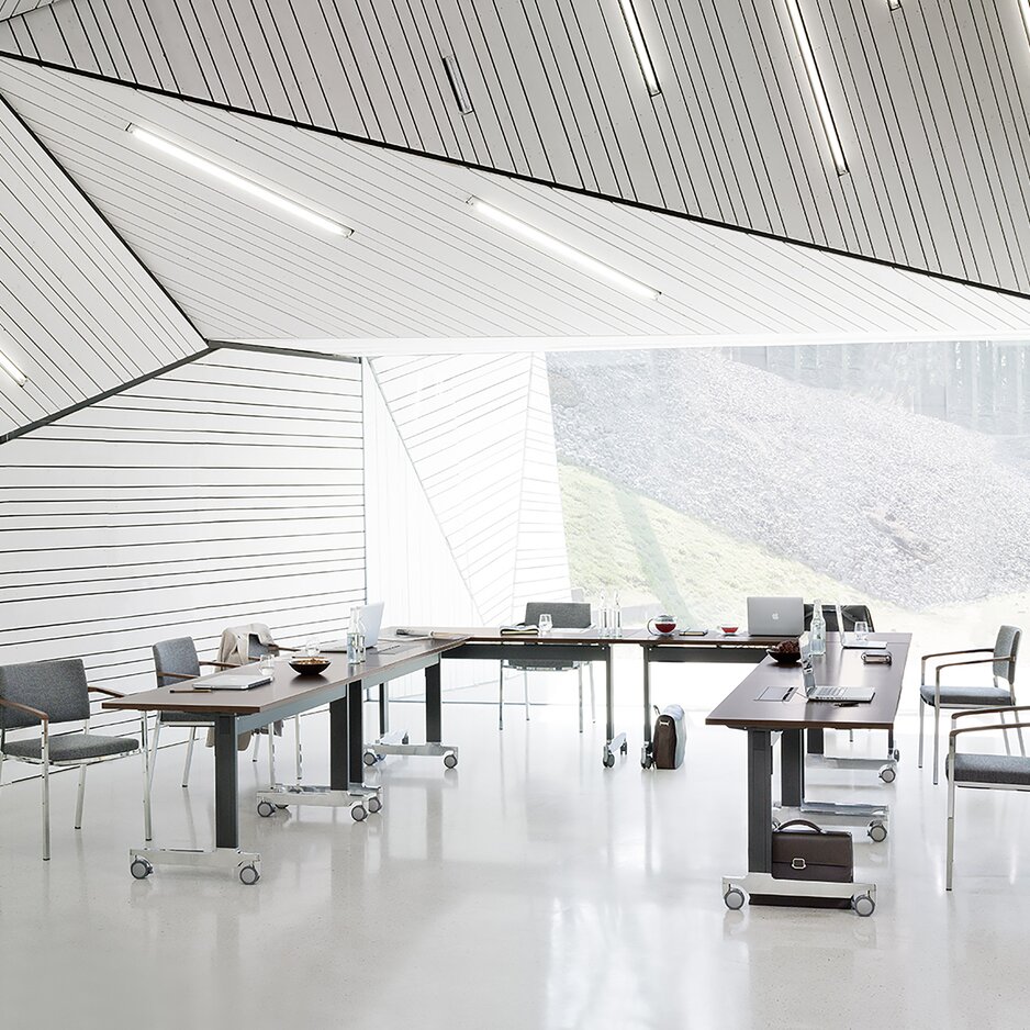Table system in glazed room.