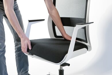 Exchangeable upholstery of a swivel chair.
