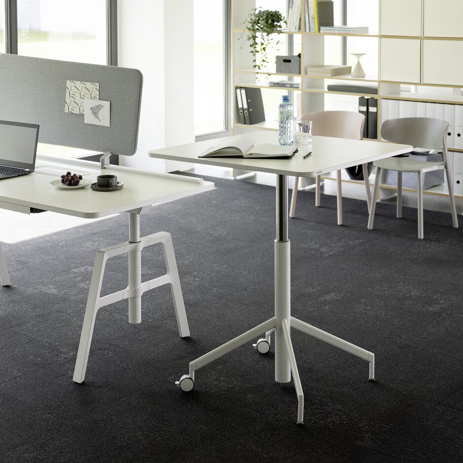 White meeting table in an office.