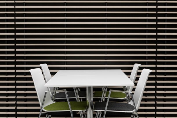 White table with colourful chairs. | © Ford Motor Company Limited