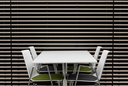 White table with colourful chairs. | © Ford Motor Company Limited