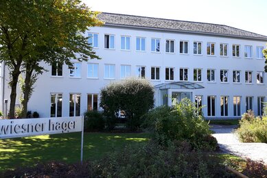White Wiesner-Hager company building from the outside.