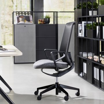 Black swivel chair from the side 